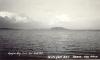 [caption on back]

The picture is taken from our camp which is on the West side of the lake.  The Land which you see in the centre of the picture is an island &amp; if you were in a boat &amp; kept bearing around to the right for about 100 miles it would take you to Port Arthur &amp; Fort William.