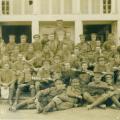 46th Battalion - S. T .  Hampson holding pennant