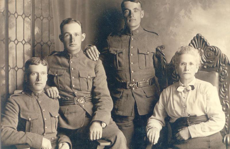 Martin, William, and George Adkins with mother, England, 1915.